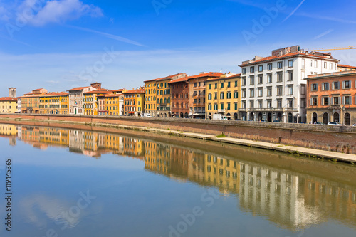 Old town of Pisa with reflection in Arno river  Italy