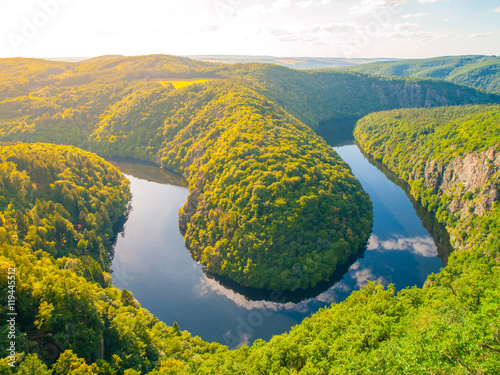 Fotografie Beautiful forest landscape with river meander in deep valley, Vltava River, Czec