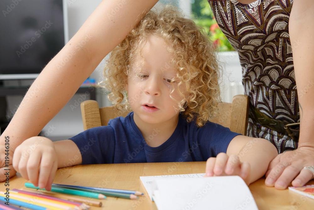 blond boy draws with his mom blond boy draws with his mom
