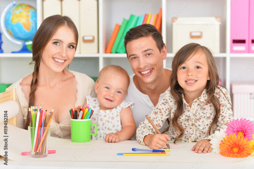 Fototapeta premium Portrait of happy family painting