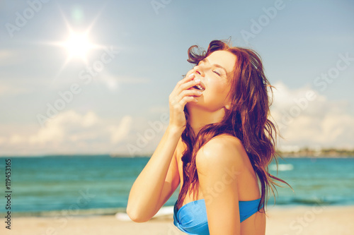 laughing woman on the beach
