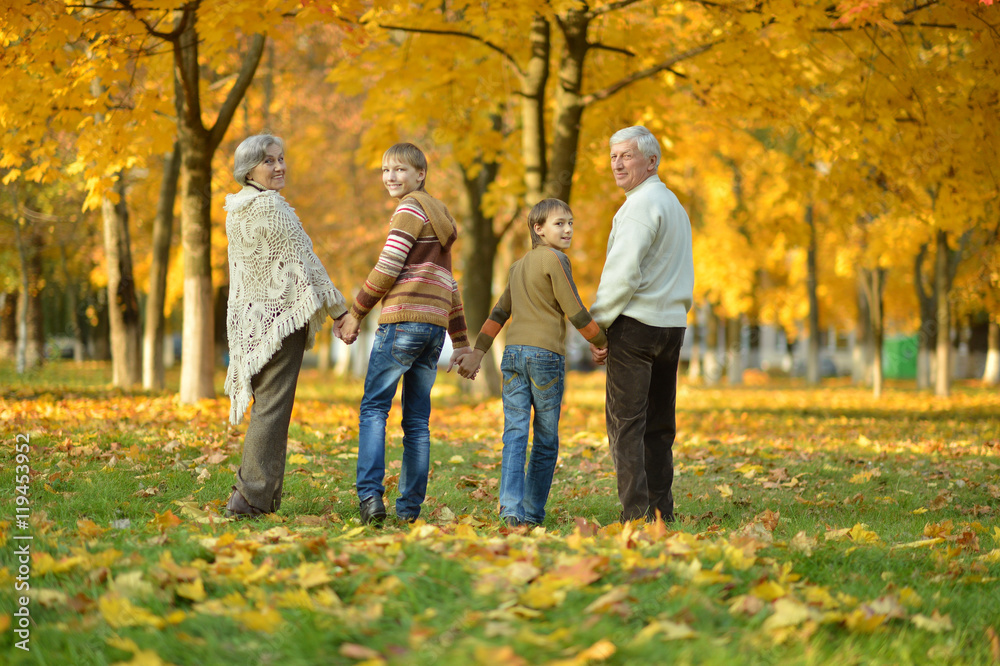 Grandparents with children in park Grandparents with children in park