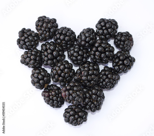 Blackberries in Heart Shape on White Background