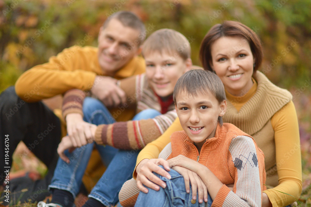 Happy family in autumn forest Happy family in autumn forest
