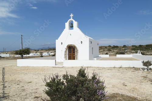 White church at Agios Konstantinos with blue sky background in Milos Greece