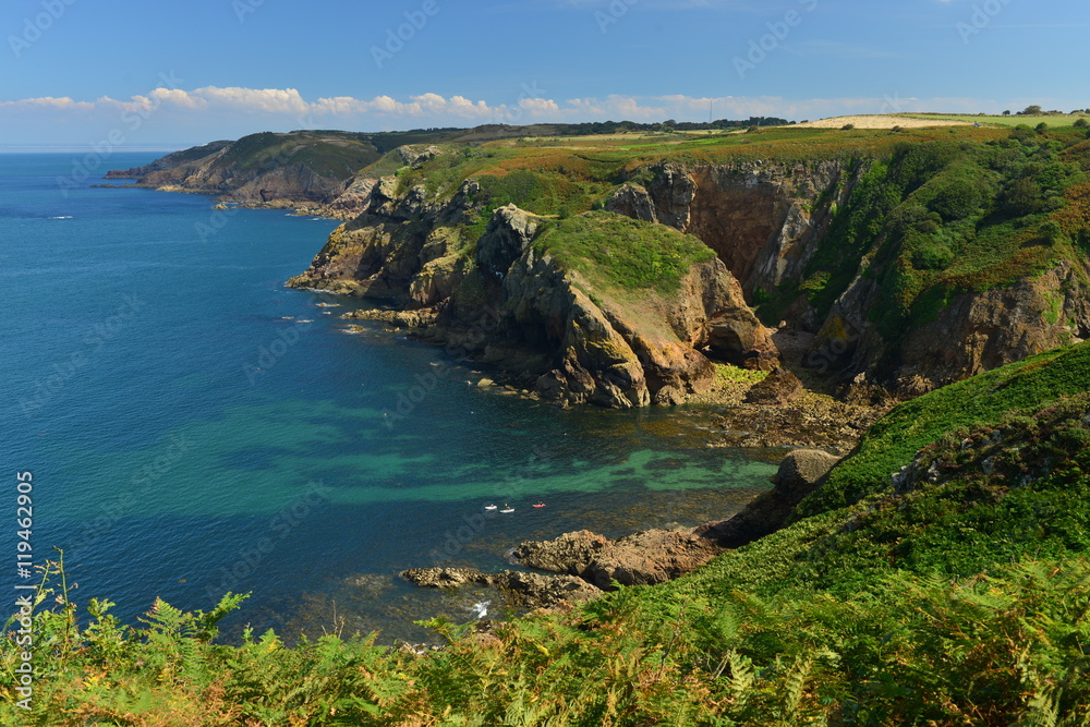 Isle L'Agois, Jersey, U.K. The islands North rugged coast in the Summer. Isle L'Agois, Jersey, U.K. The islands North rugged coast in the Summer.