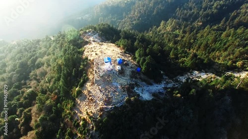 Poon hill peak lookout tower, Himalayas, Nepal. Aerial view mountain panoramic 4k video nature background. photo