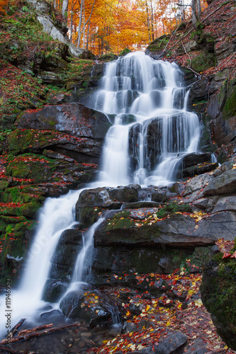 rocky Waterfall in Autumn forest © serkucher