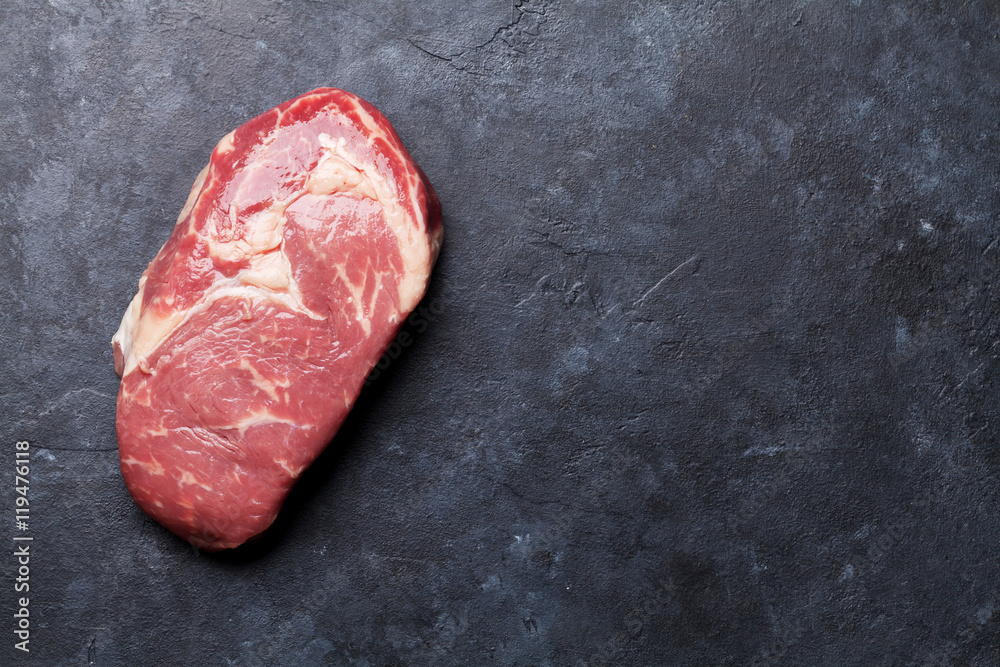 Raw beef steak cooking