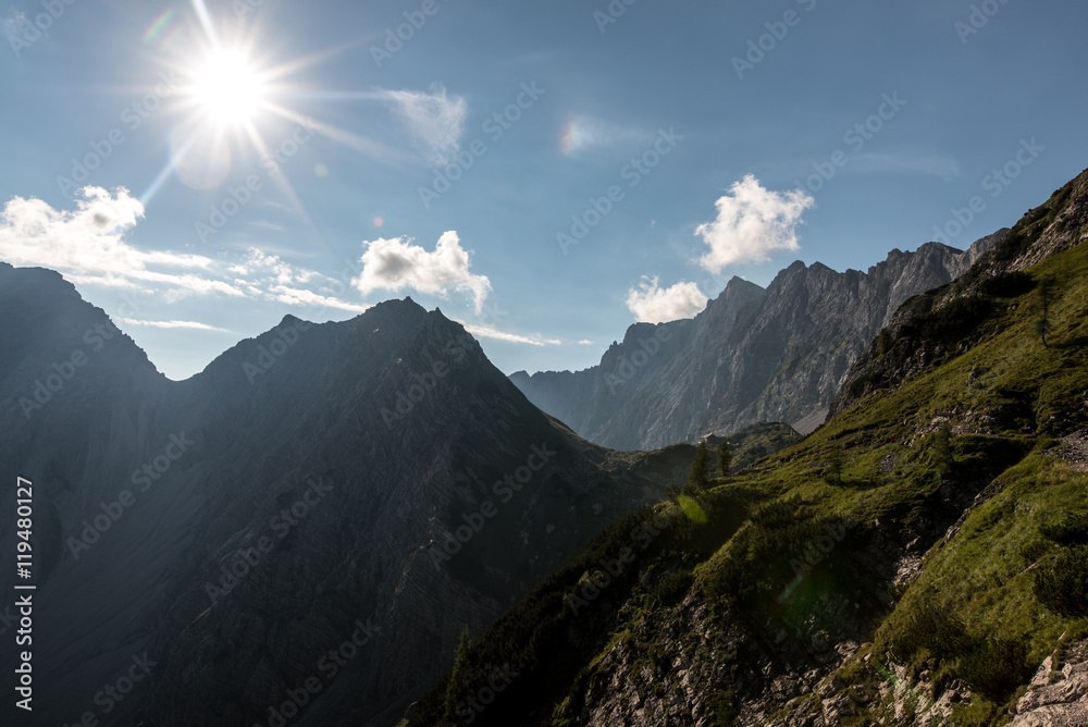 Fototapeta premium Hiking in the morning hours in the mountains of Austria