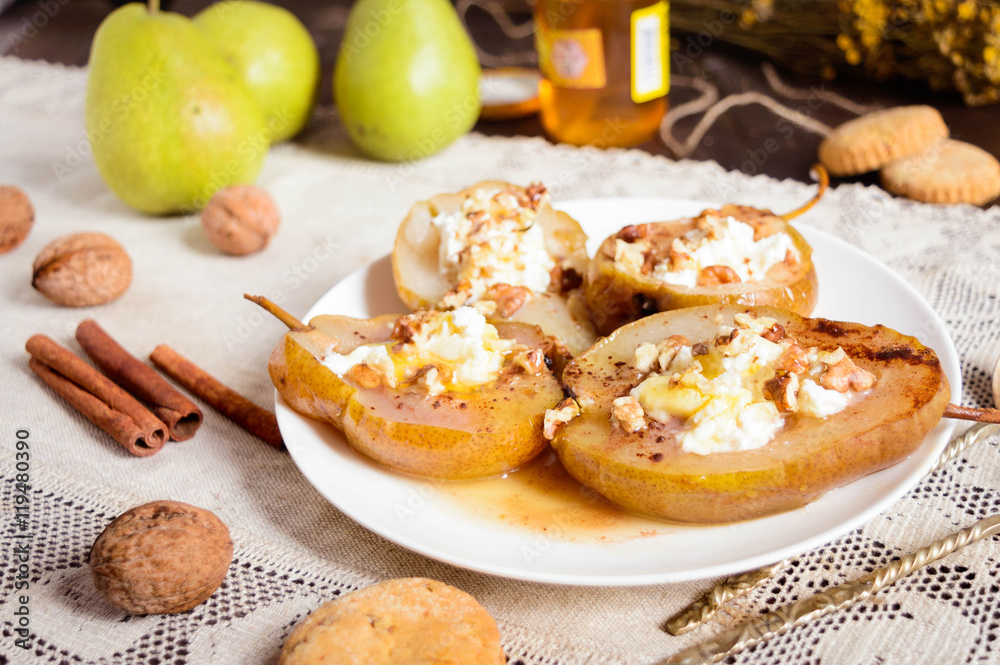 baked pear stuffed with ricotta, honey, cinnamon and nuts baked pear stuffed with ricotta, honey, cinnamon and nuts