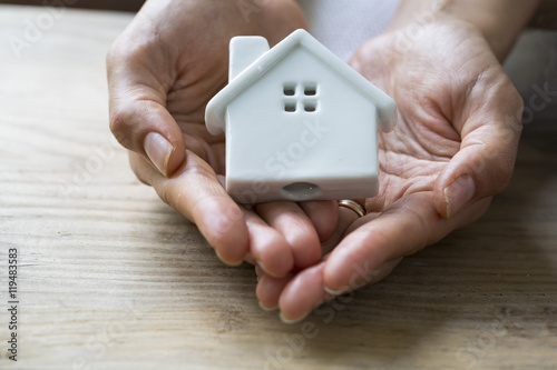 Hands Holding Home photo