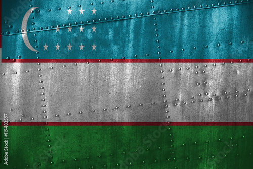 metal texutre or background with Uzbekistan flag