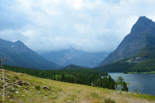 Scenic lake among tall mountains in Glacier.