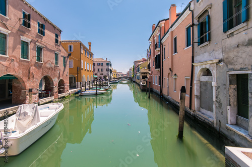 Characteristic canal in Chioggia  lagoon of Venice.