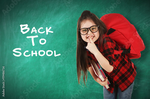 School concept. Cute girl w...