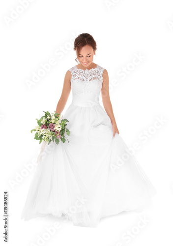 Beautiful bride with wedding bouquet isolated on white