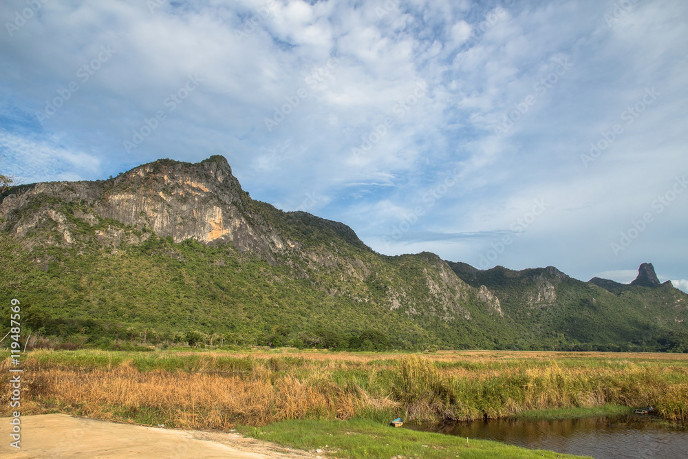 Beautiful calcite mountain with blue sky at khao sam roi yod nat