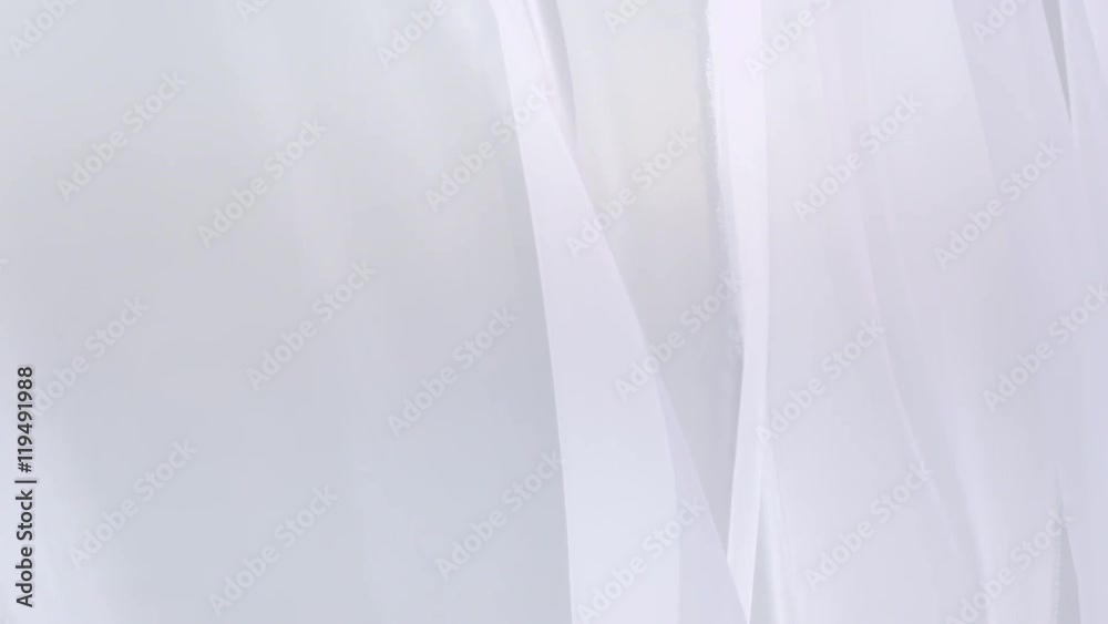 Sheer white curtains blowing in the wind Sheer white curtains blowing in the wind