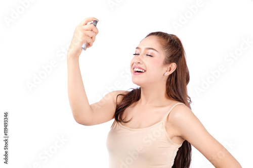 Portrait beautiful woman with mineral water spray.