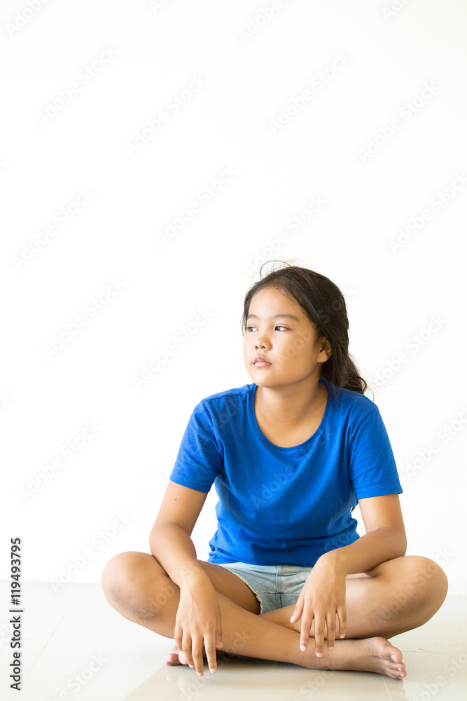 Asian children siting in living room Asian children siting in living room