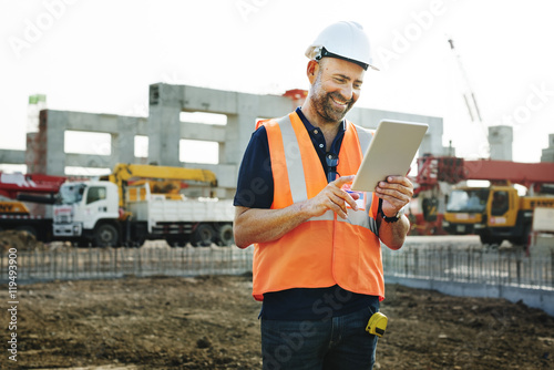 Construction Site Engineerer Working Blueprint