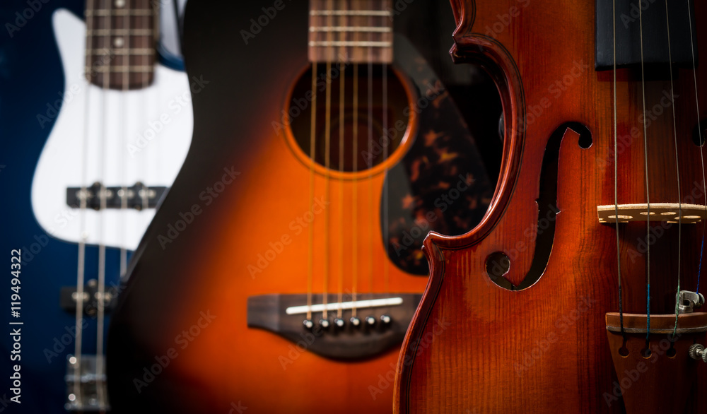 Obraz premium violin, acoustic guitar & electric bass for musical instrument concept