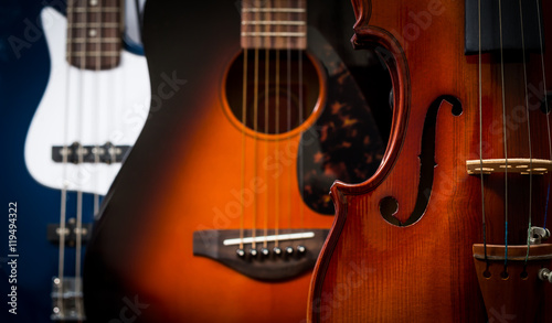 violin, acoustic guitar & electric bass for musical instrument concept