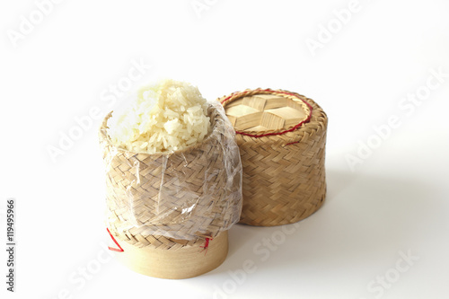 sticky rice in bamboo wooden basket isolated on white background
