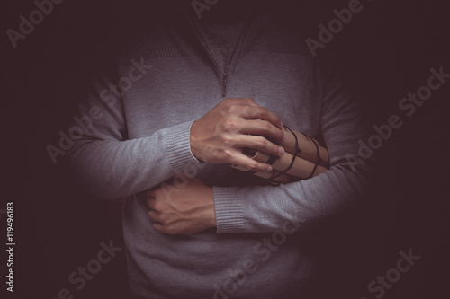 Vintage tone of hand with time bomb. © aradaphotography