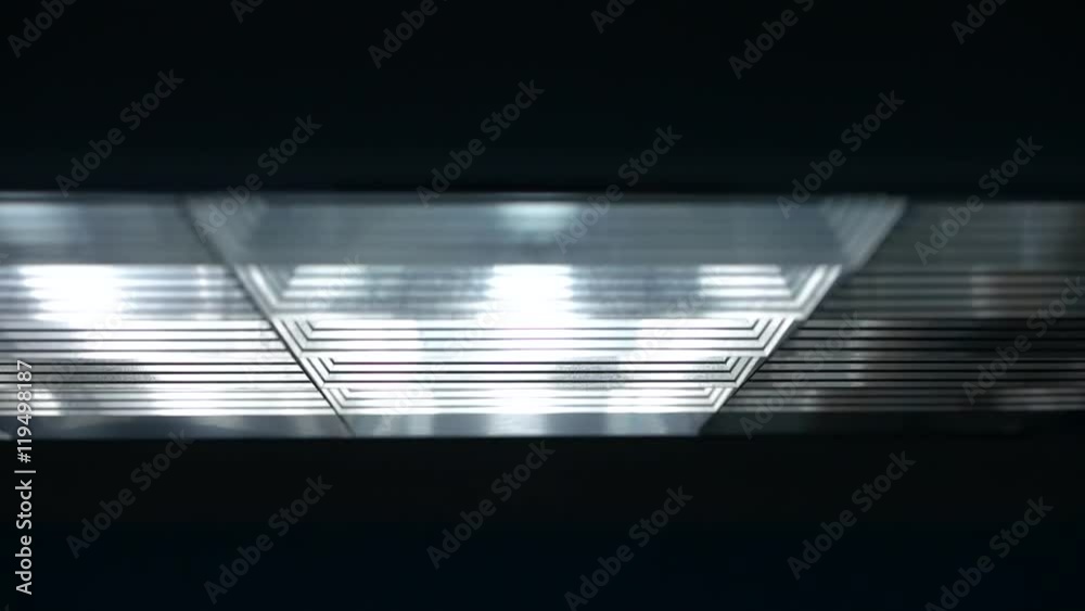 Fluorescent lights turning on and off