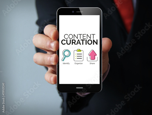 Content curation graphic on the screen businessman smartphone photo