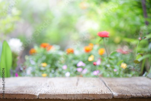 outdoor wooden table view with flowers
