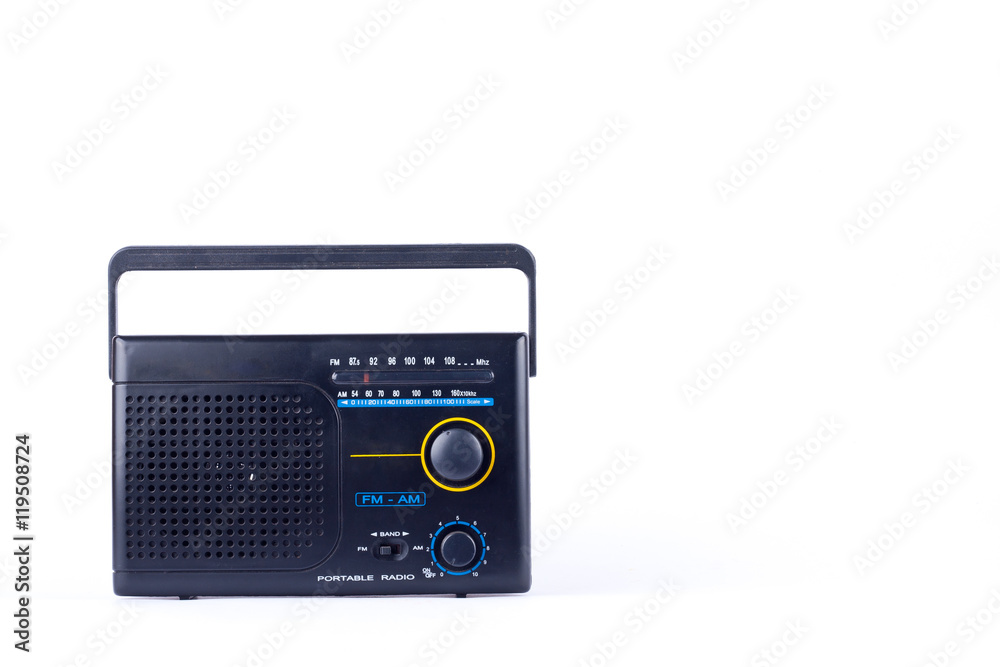 black vintage retro style AM, FM portable radio transistor receiver on white background  isolated 
