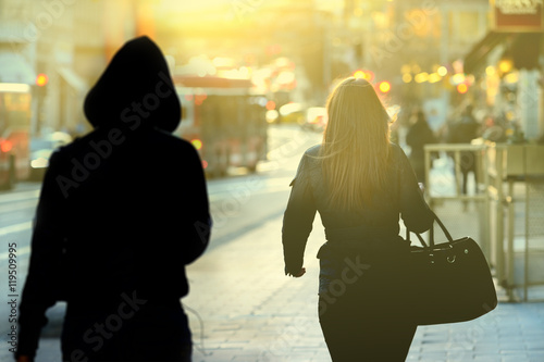 Woman being followed photo