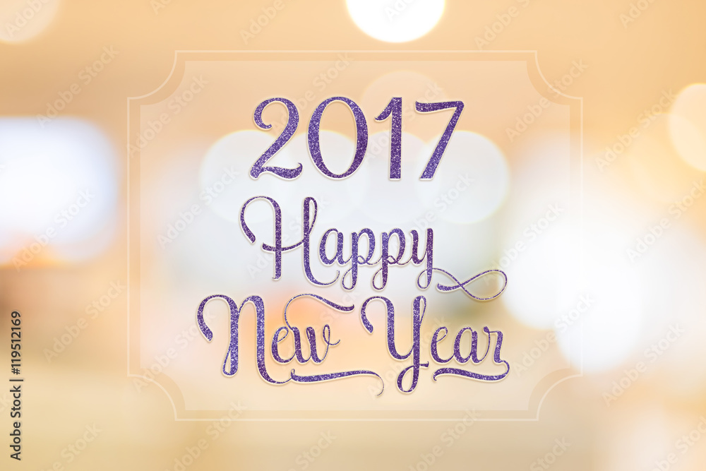Happy New year 2017 glitter texture word on white frame at abstr