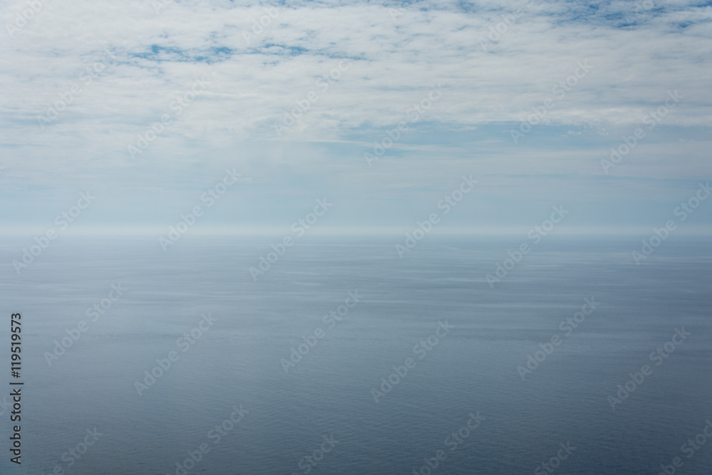 Empty blue sky and blue sea background copy space