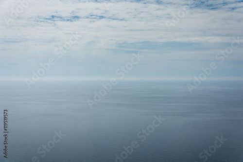 Empty blue sky and blue sea background copy space