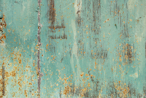 old surface of the metal sheet covered with old paint, creative background of rusty metal, great background or texture for your project
