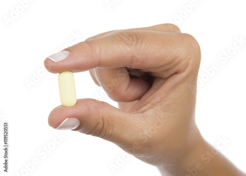 Orange Pill in Hand