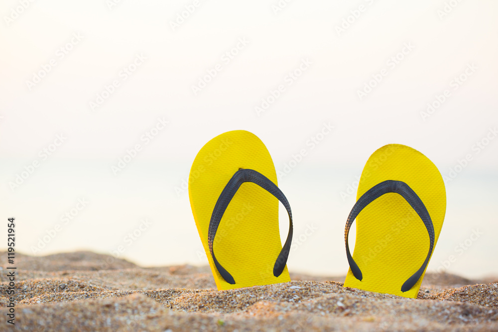 Fototapeta premium flip-flop on the beach