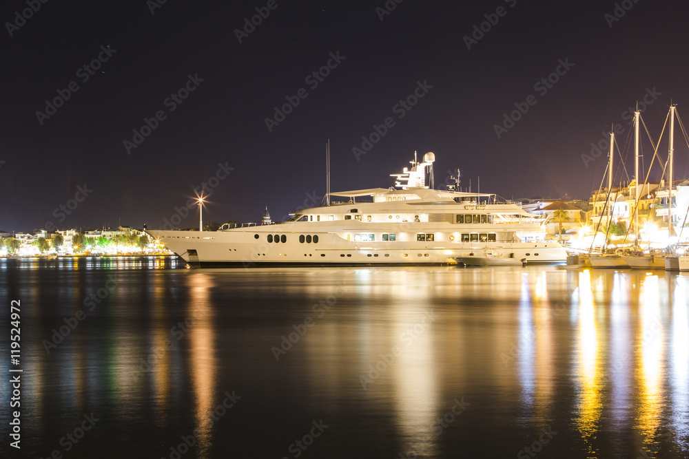 luxurious modern private yacht at the pier at night. Zakynthos, Greece