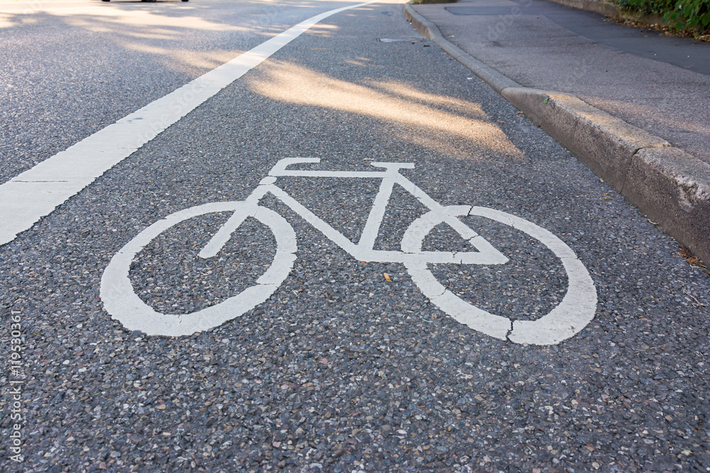 Obraz premium Painted Street Asphalt Bicycle Lane Sign White Safety