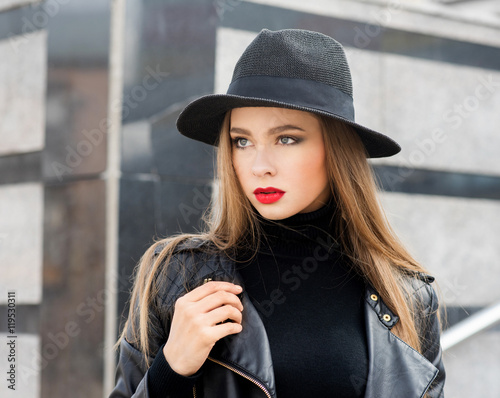 Fashion portrait stylish pretty woman outdoor. Young woman weari