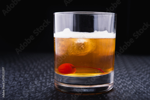 alcoholic cocktail with cherry