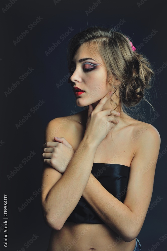 Spring model with flowers in her hair and fashion makeup . Summer girl with trendy make up and hairstyle . Spring model with flowers in her hair and fashion makeup . Summer girl with trendy make up and hairstyle .