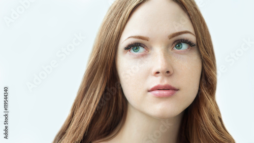 Beauty Model with Perfect Fresh Skin and Long Eyelashes.