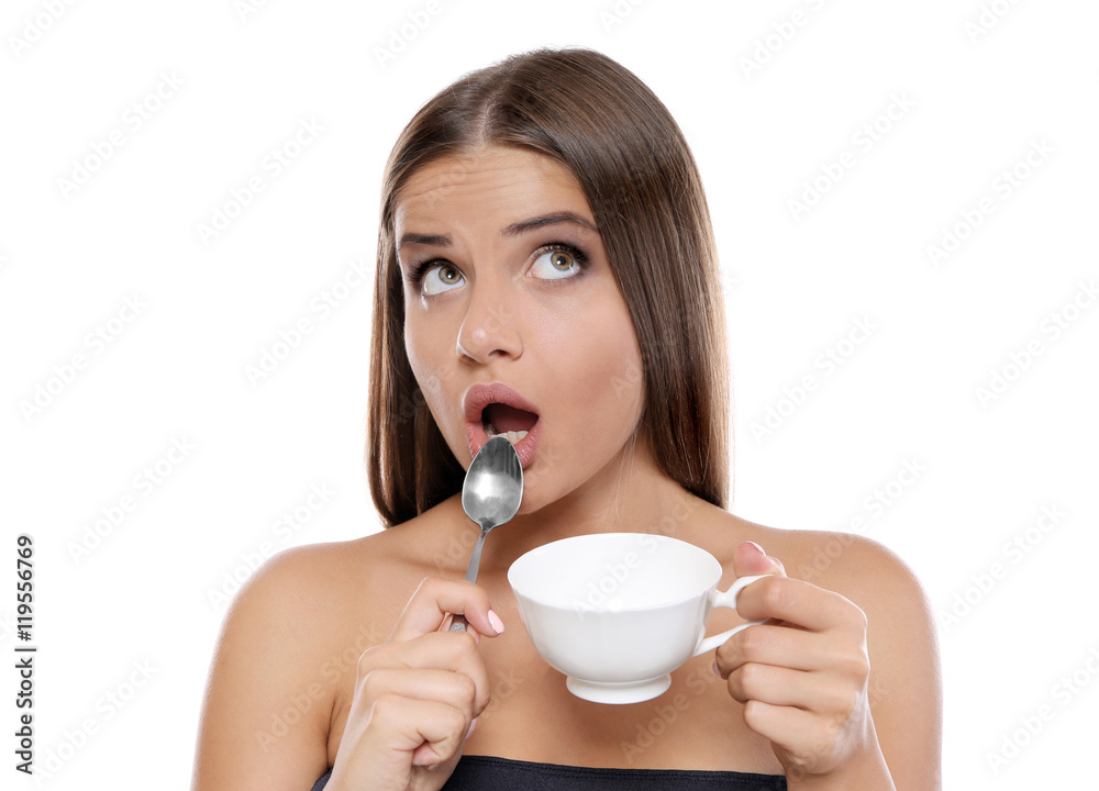 Beautiful young woman drinking coffee on white background Beautiful young woman drinking coffee on white background