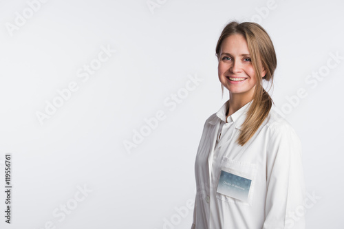 Beautiful nurse portrait on white with copy space