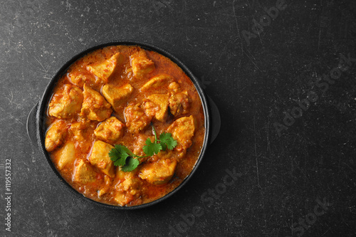 Chicken curry on dark background